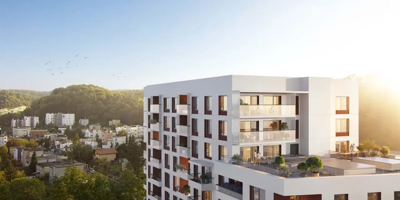 Nowe inwestycje Gdynia: nowoczesny apartamentowiec z tarasami i widokiem na zieleń.