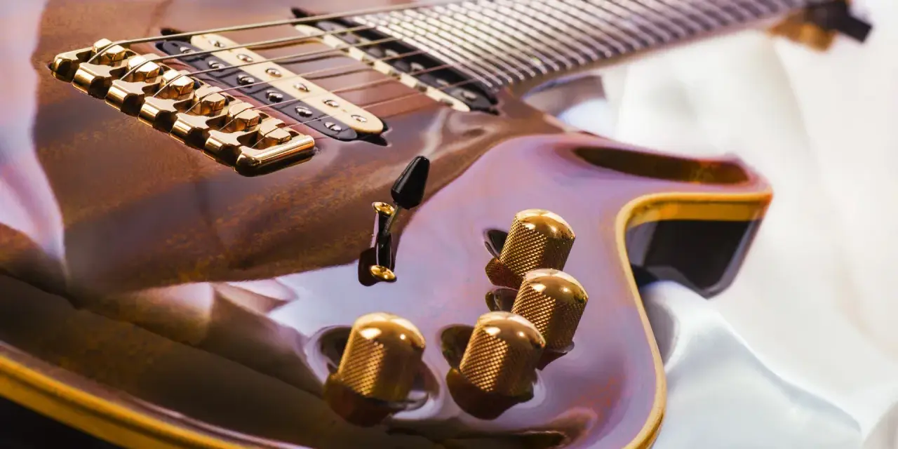 Glänzende E-Gitarre mit goldenen Details, bereit, um das Gitarre lernen zu beginnen.
