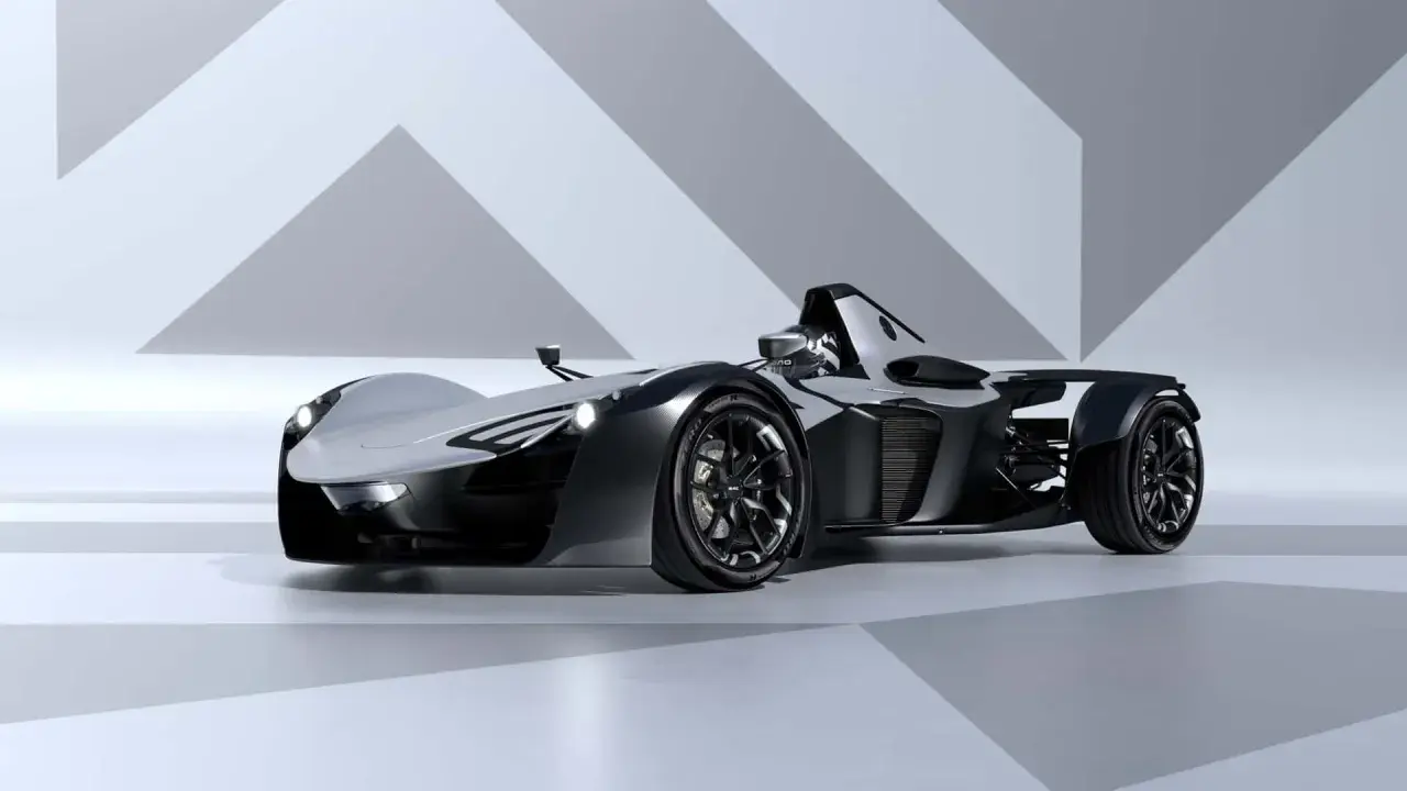 Srebrno-czarny, futurystyczny bolid BAC Mono z ostrymi liniami i aerodynamicznym kształtem, gotowy do wyścigu.