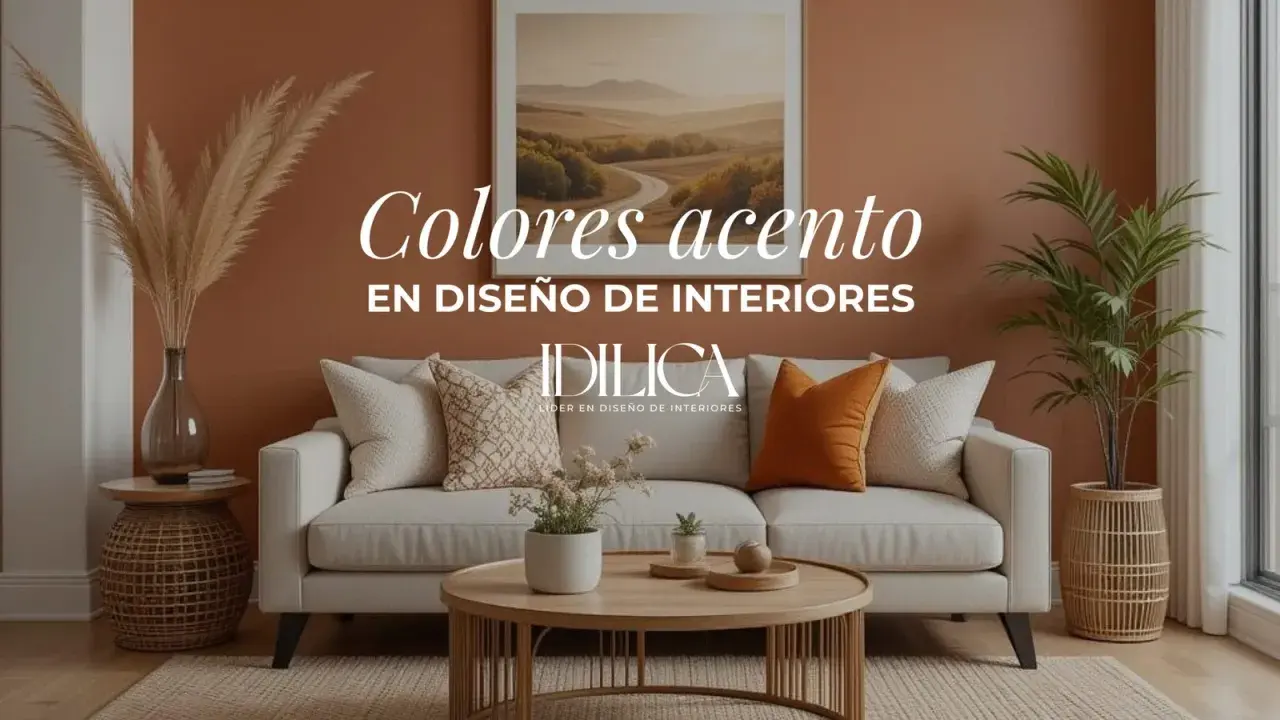 Sofá beige con cojines decorativos, uno de ellos naranja como **color acento**, en una sala de estar cálida.