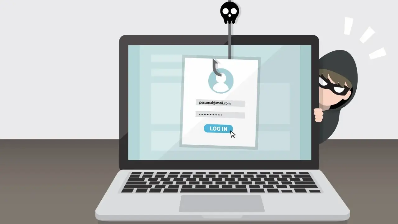 Ein Hacker lauert hinter einem Laptop, der eine gefälschte Login-Seite anzeigt. Ein Fischhaken mit Totenkopf symbolisiert, wie funktioniert phishing.