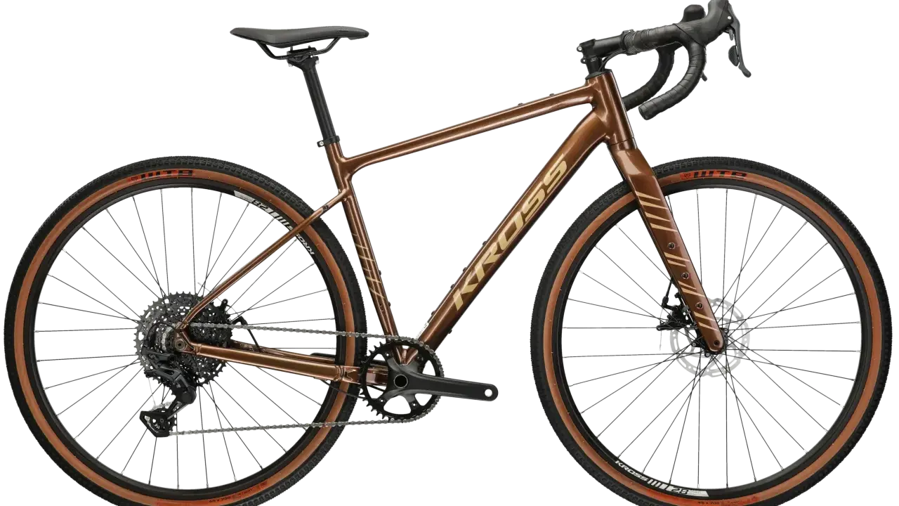 Brązowy rower gravelowy Kross Esker 2.0 Gen 2 z napędem i hamulcami tarczowymi.