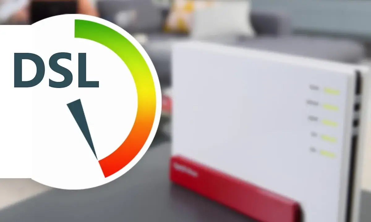 DSL-Router mit Anzeige für 16 mbit/s Geschwindigkeit. Im Hintergrund ein Wohnzimmer.