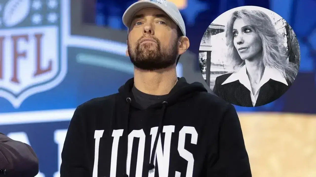 Eminem jako muzyk, w czarnej bluzie z kapturem z napisem "LIONS", obok okrągłego zdjęcia kobiety.
