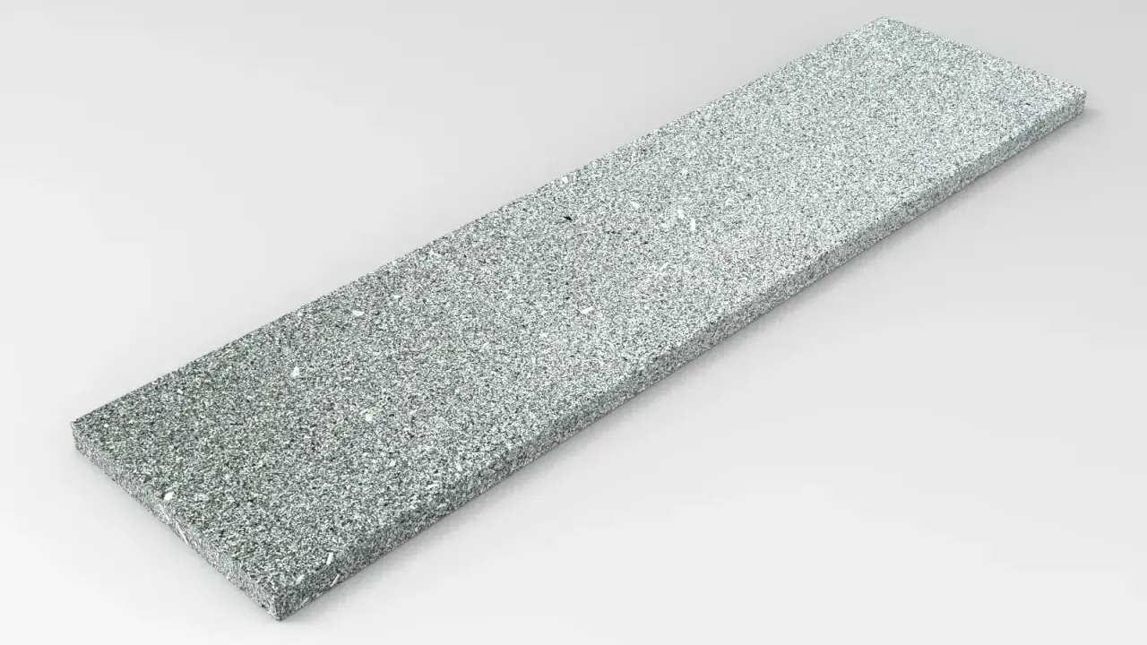 Błyszczący bianco perla granit w formie płyty, idealny na elegancki blat lub parapet.
