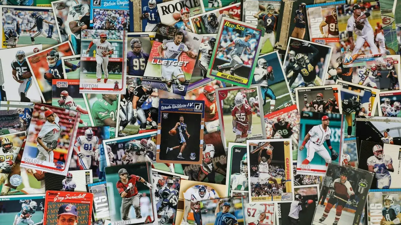 A colorful collage of sports trading cards, showcasing baseball, basketball, and football players. This collection could be part of an art consignment, where unique items are displayed and sold.