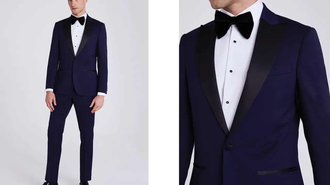 A man models a navy tuxedo with black satin lapels. Inquire about how much are tuxedos rentals for your next formal event.