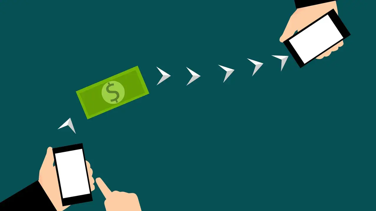 Ilustración que muestra cómo se hace una transferencia bancaria: un billete de dólar se mueve de un teléfono a otro, indicando el proceso.