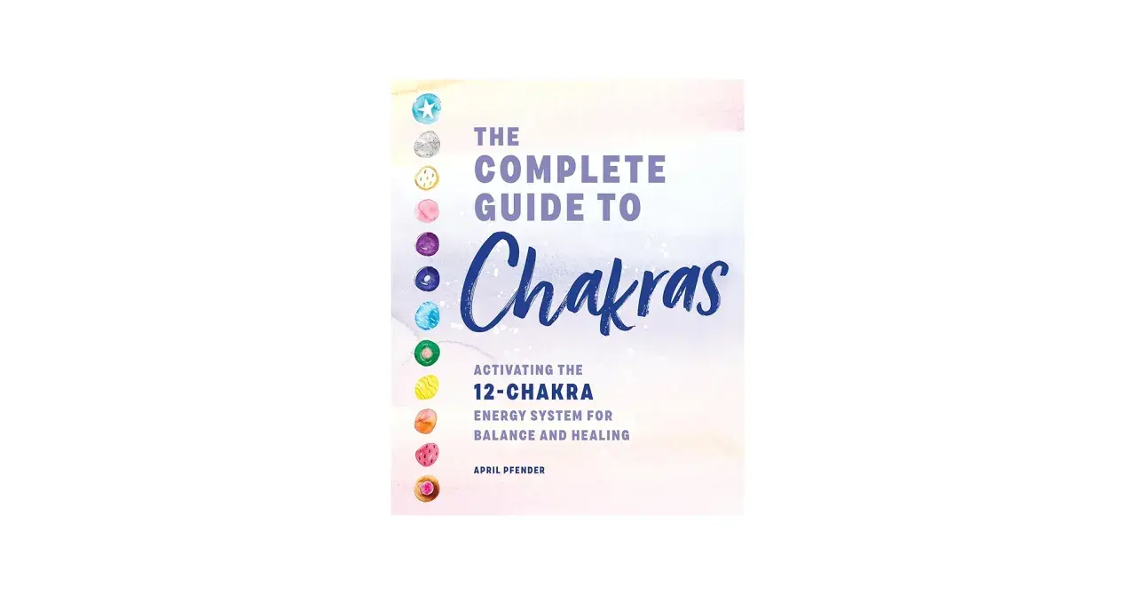 Boken "The Complete Guide to Chakras" visar en färgstark illustration av 12 chakran, redo att aktiveras för balans och helande.