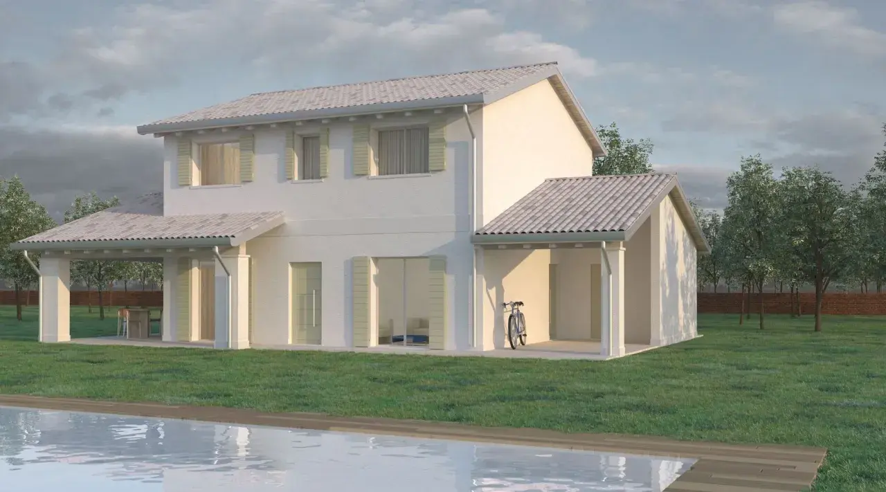 Case a due piani con portico, piscina e giardino. Una bicicletta appoggiata al muro.
