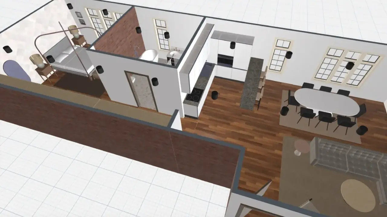 Distribución loft: dormitorio con cama, baño, cocina moderna y salón comedor con mesa ovalada y sofá.