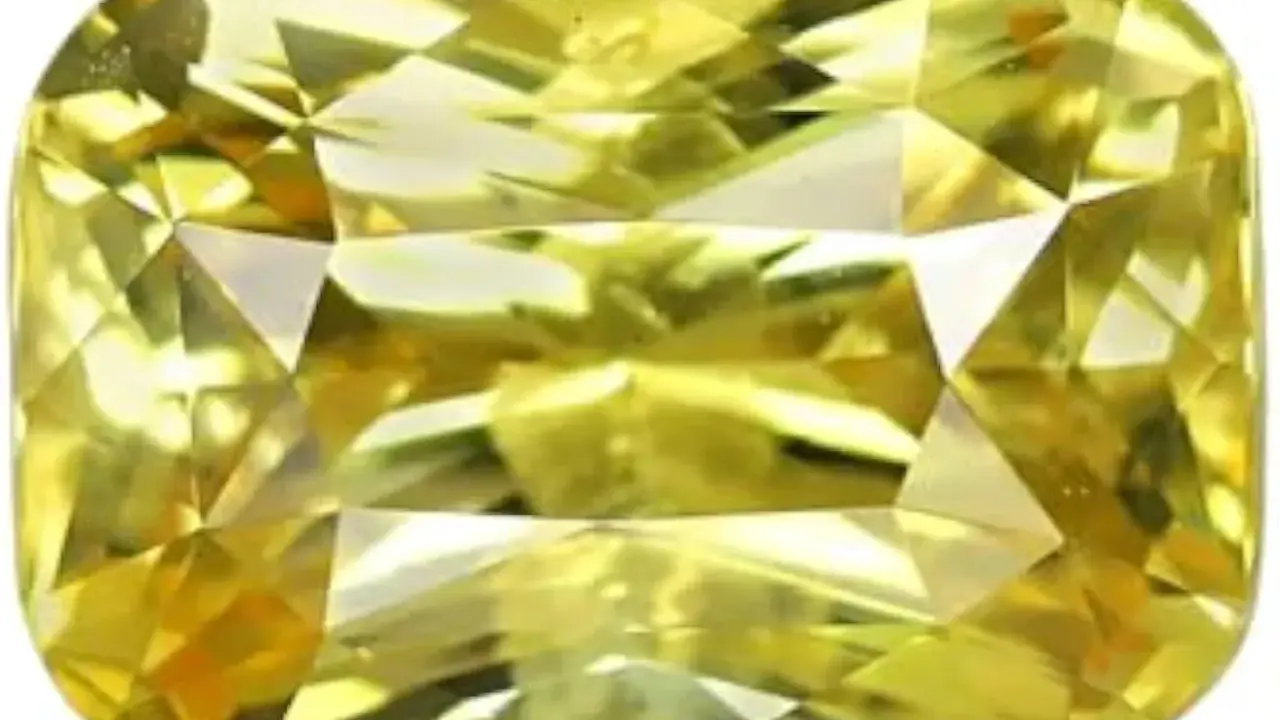 Zaffiro giallo brillante, simbolo di gioia e prosperità. Il suo significato è legato alla saggezza e all'abbondanza.