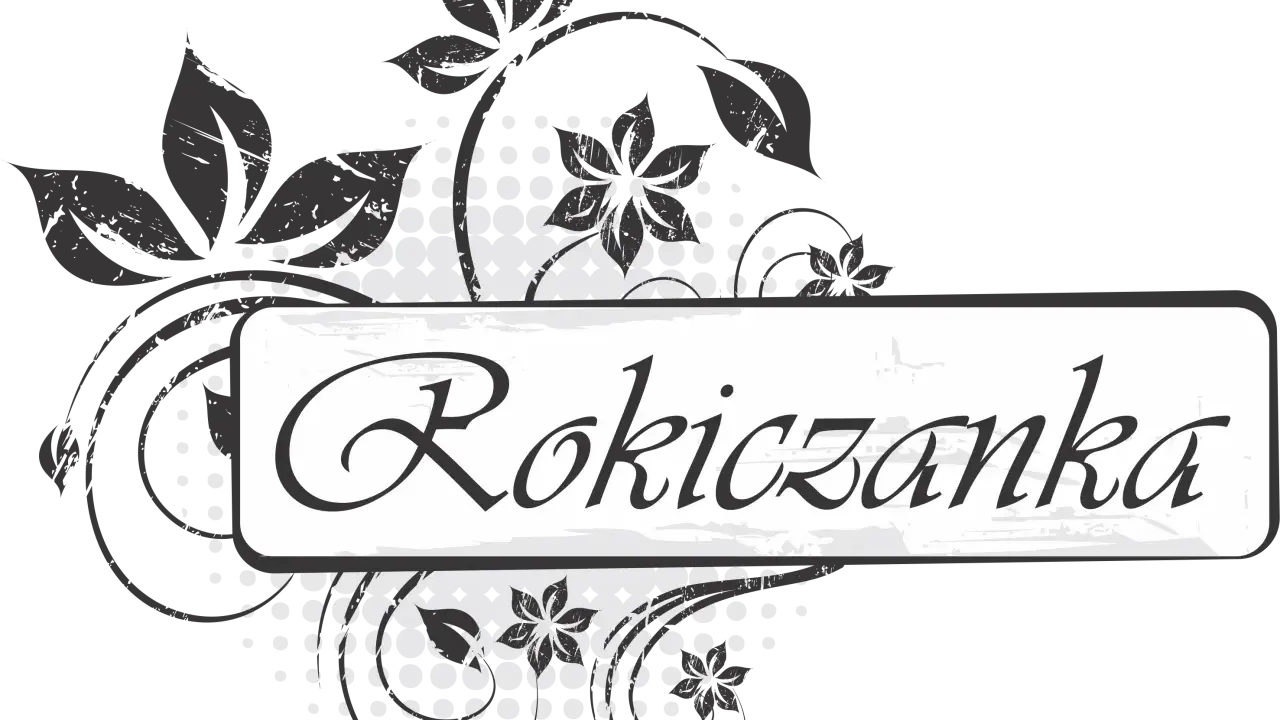 Rokiczanka hej, w dzień narodzenia tekst. Stylizowany napis z motywami roślinnymi.