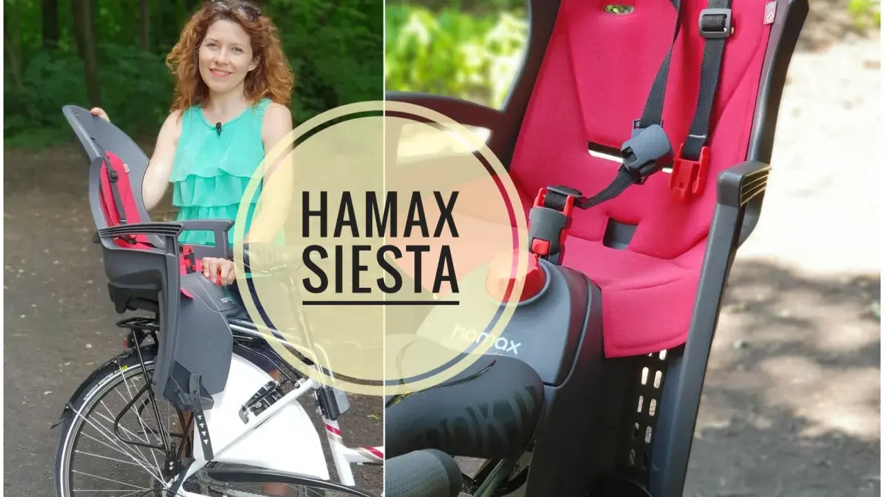 Kobieta prezentuje fotelik rowerowy Hamax Siesta, idealny do bezpiecznych podróży z dzieckiem.