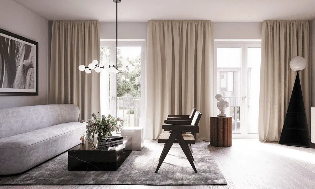 Ett modernt vardagsrum med en elegant soffa, mörkt marmorbord och en unik golvlampa. Blå inredning i vardagsrummet skapar en lugn atmosfär.