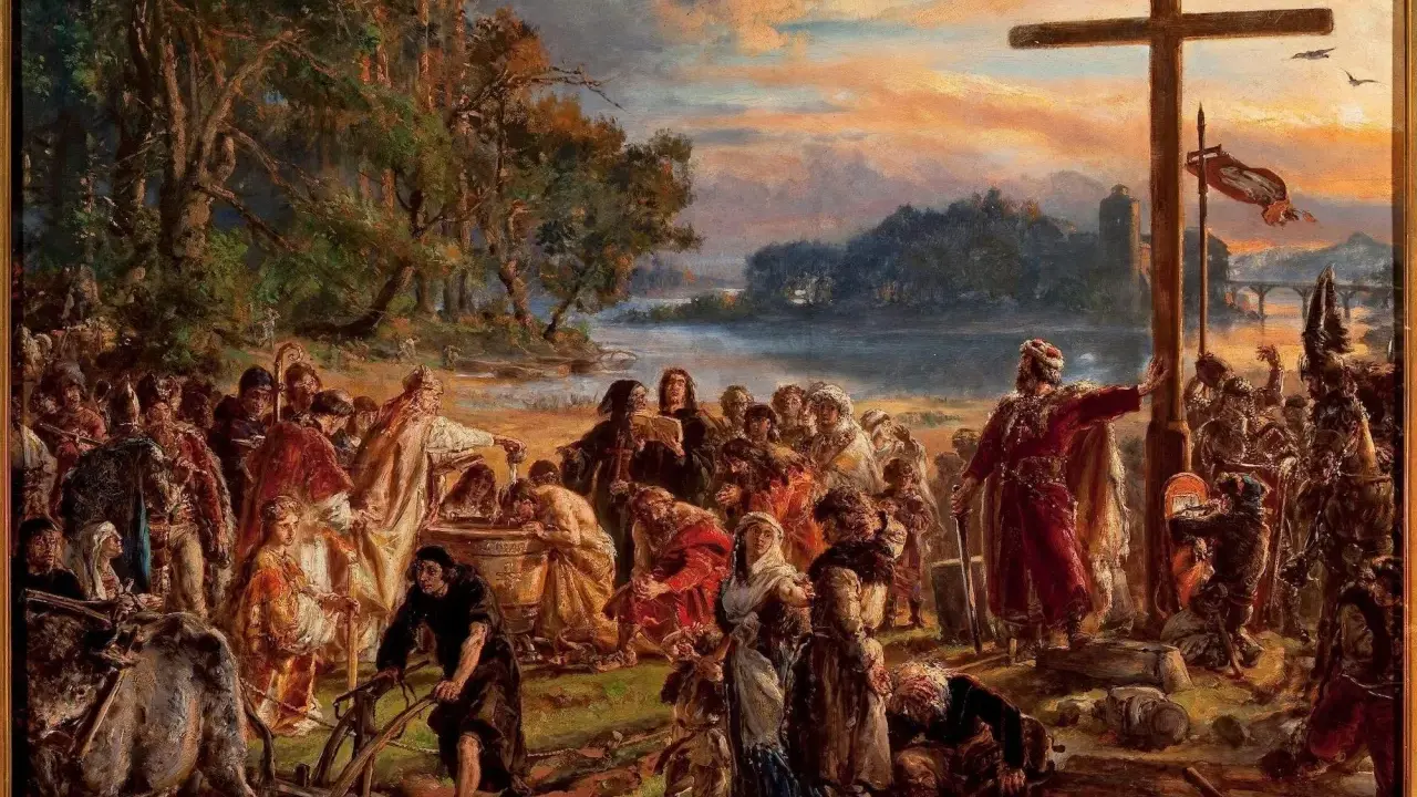 Chrzest Polski. Ludzie przy krzyżu, symbolizującym przyjęcie chrześcijaństwa, przypominają o misji, jaką mieli Cyryl i Metody, kim byli i co zrobili dla Słowian.