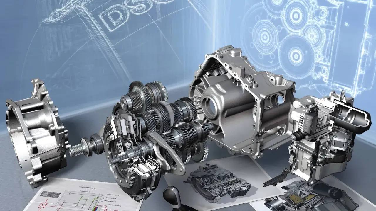 Rozłożony na części mechanizm DSG, z widocznymi trybami i schematami technicznymi.