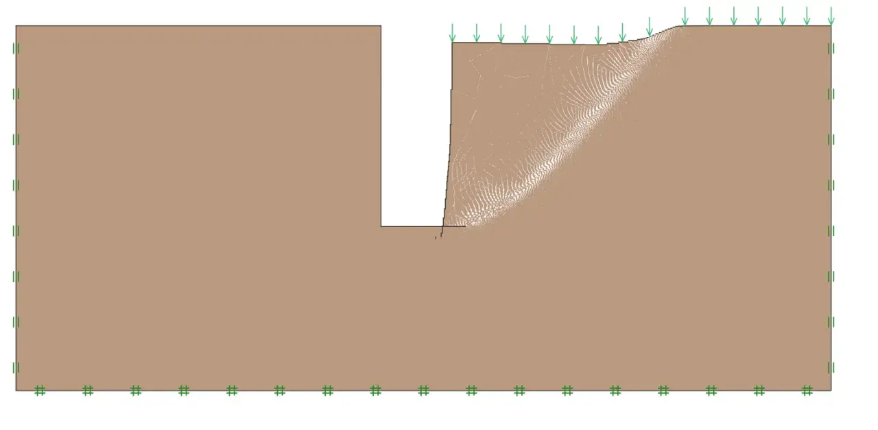 Simulación de estabilidad de talud, mostrando la falla de una zanja bajo carga.
