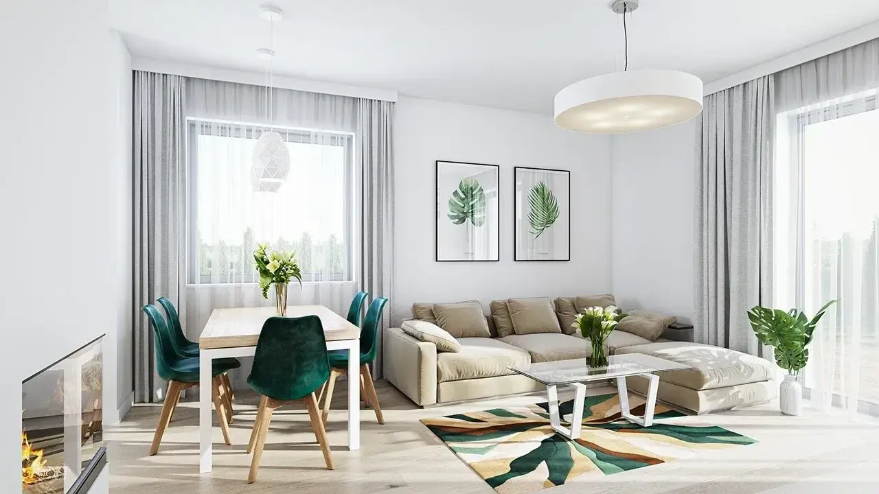 Nowoczesny salon z jadalnią w projekcie domu Kasia 2. Jasne wnętrze z beżową kanapą, zielonymi krzesłami i geometrycznym dywanem.