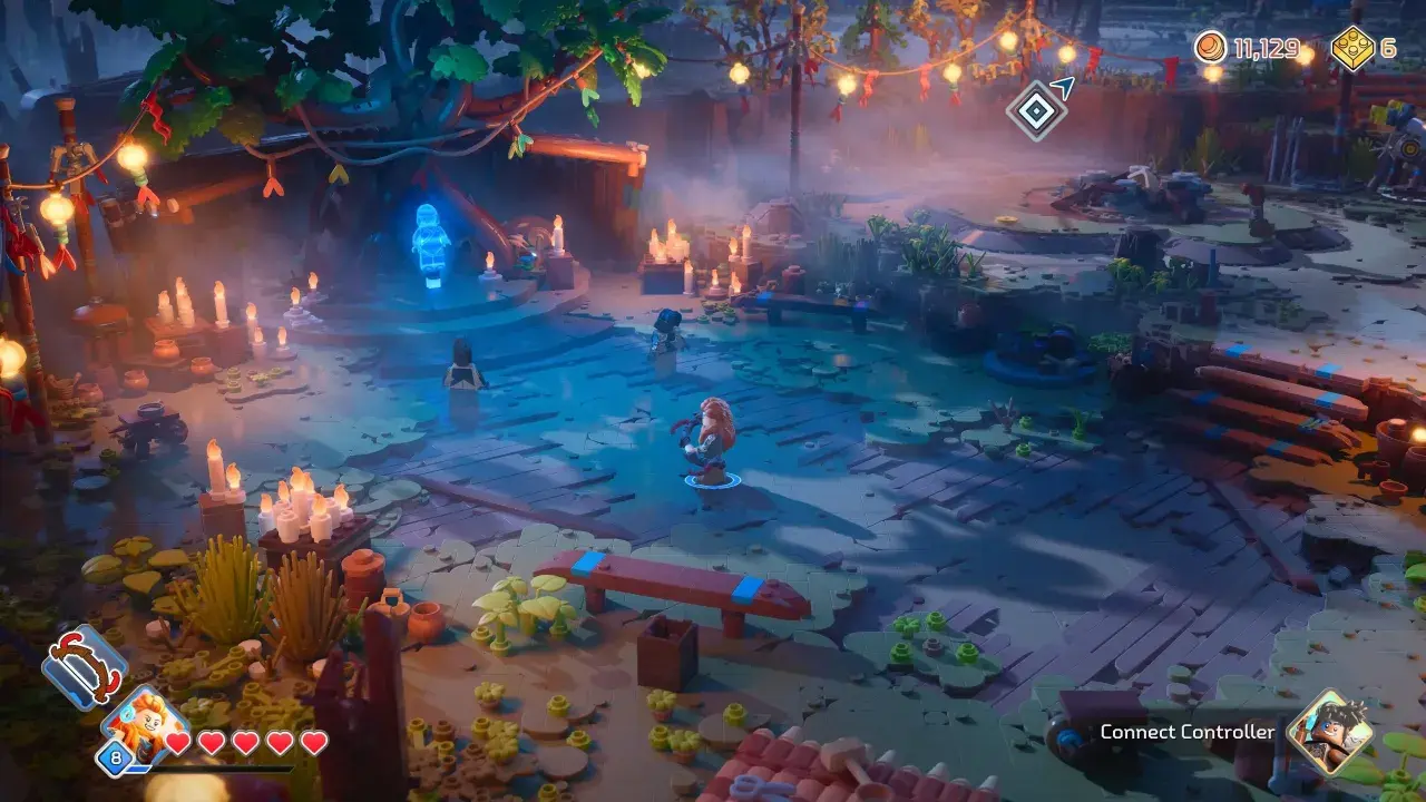 Witaj w świecie Lego Horizon Adventures! Postacie z klocków eksplorują tajemniczą, oświetloną świecami krainę.