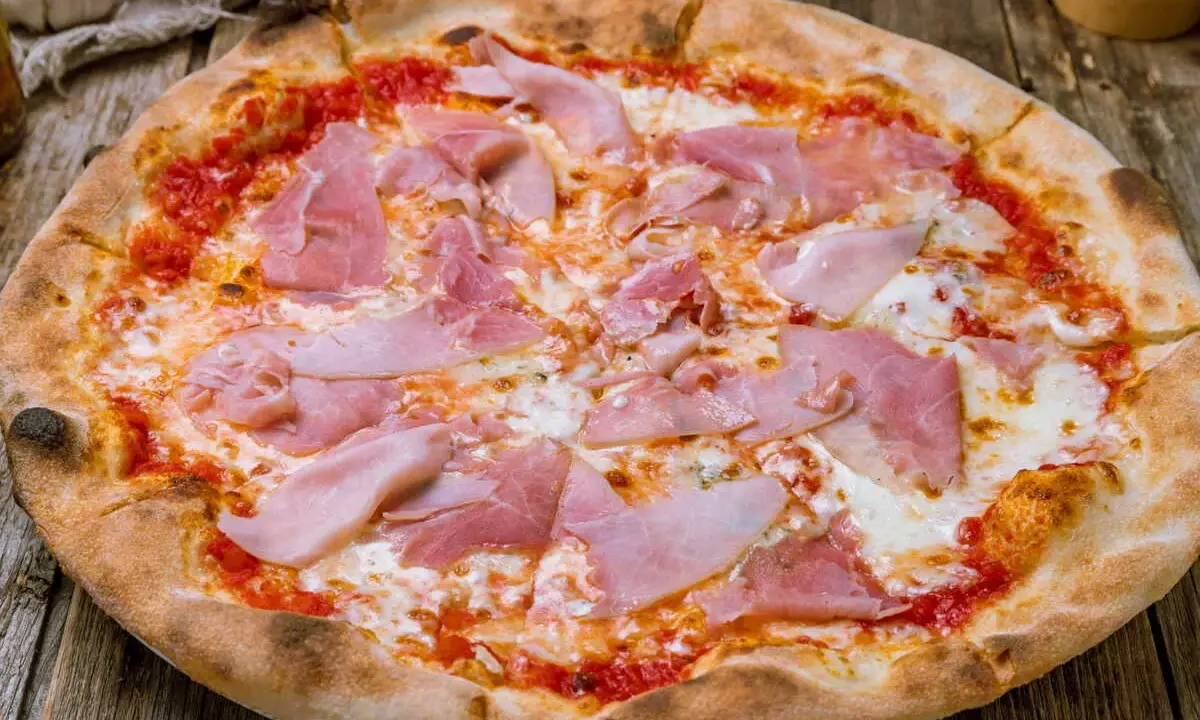 Recette pizza jambon-fromage : astuces de pro pour une pâte parfaite