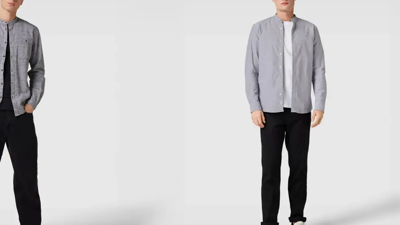 Zwei Männer in grauen Hemden mit Stehkragen und schwarzen Hosen. Welches graues Hemd passt besser zum Anzug?