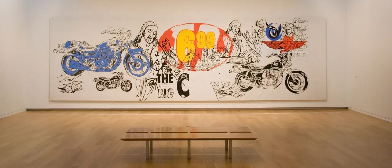 Andy Warhol's "The Last Supper" reimagined with motorcycles and bold graphics, a vibrant commentary on faith and consumerism.