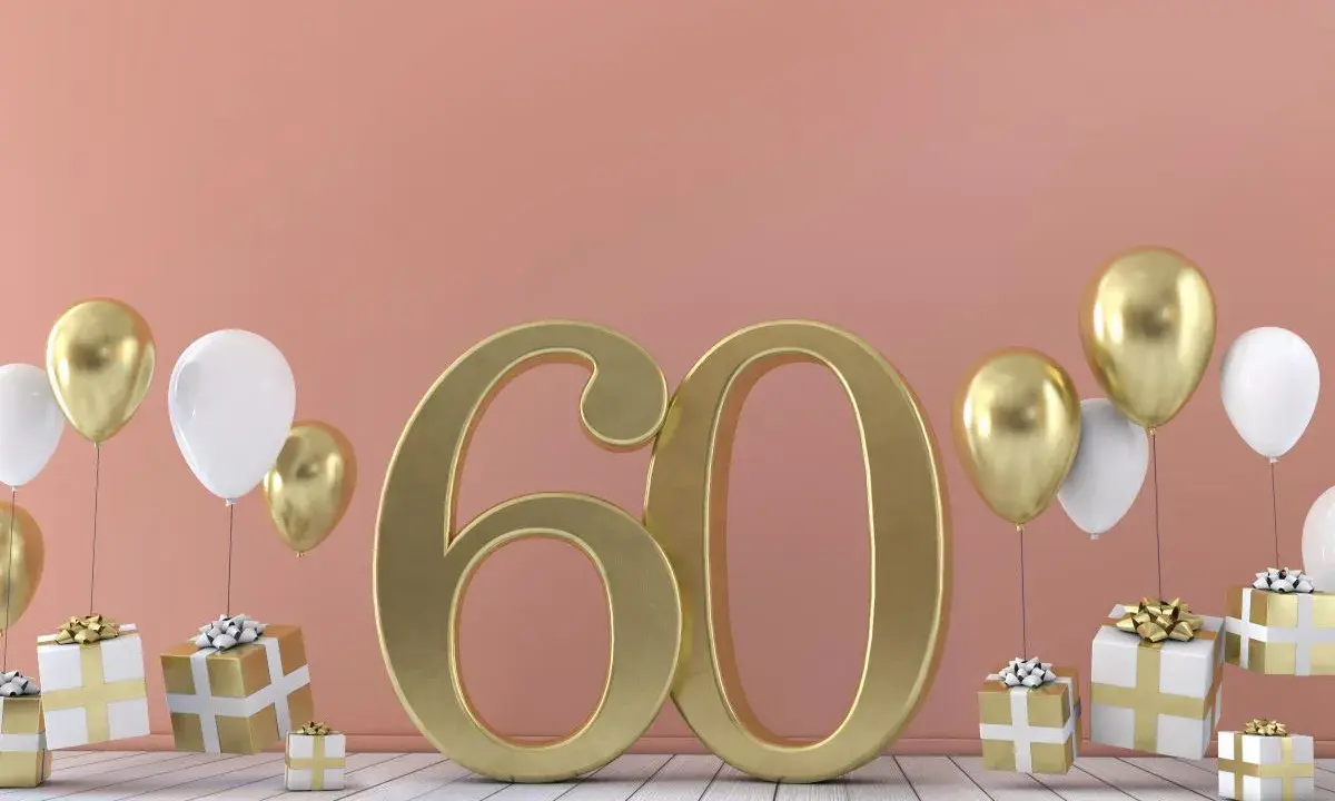 Złota liczba 60, balony i prezenty. Idealne życzenia na 60 urodziny!