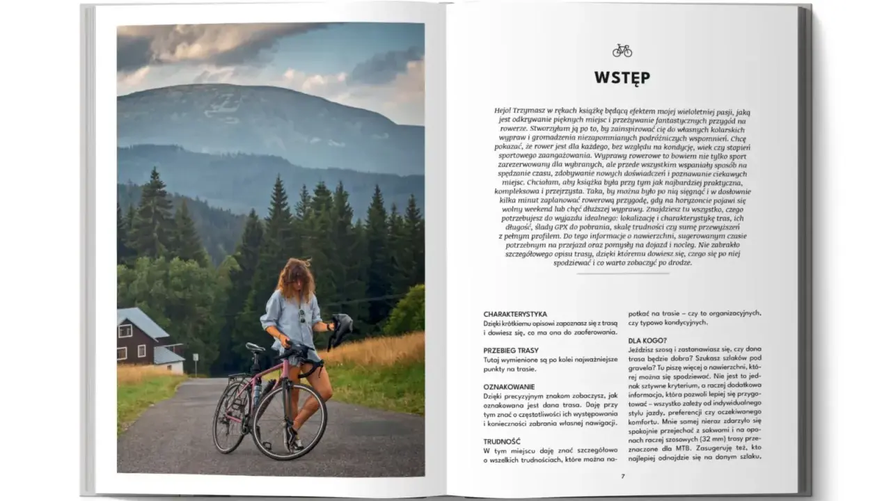 Kobieta z rowerem na tle górskiego krajobrazu. Idealne miejsce na **trasę rowerową Hel**.