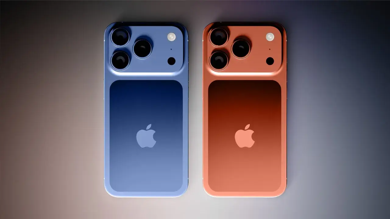 Dwa iPhone'y: niebieski i miedziany. Różnica między iPhone Pro a zwykłym często tkwi w aparacie.