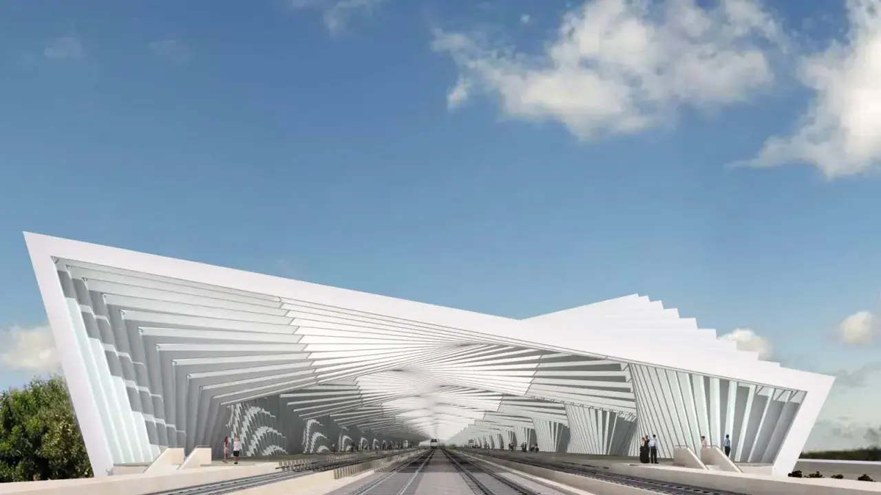 Stazione Reggio Emilia, un capolavoro dell'architetto con un tetto bianco a spirale che copre i binari.