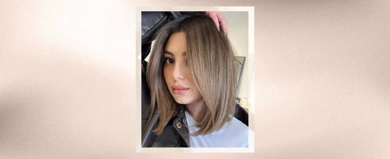 Mujer con corte bob asimétrico, ideal para cortes de pelo cara cuadrada.