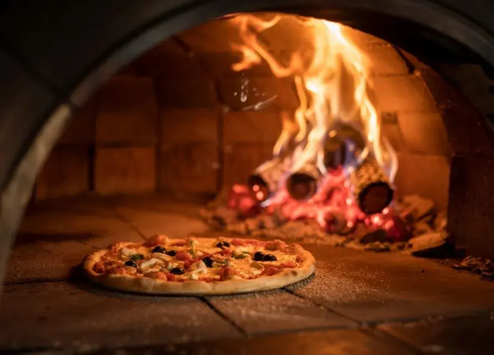 Na jakim trybie piec pizzę? Odkryj sekrety idealnego spodu!