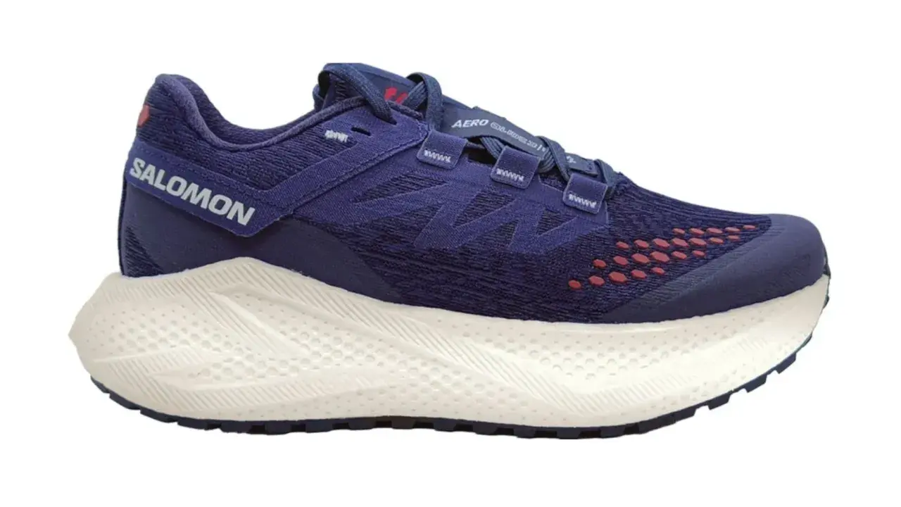 Granatowe buty Salomon Aero Glide 3 z białą podeszwą, idealne do biegania.