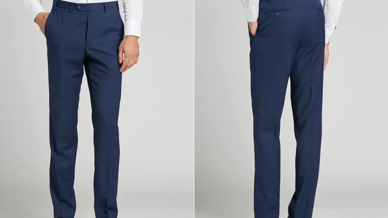 Front and back views of navy blue dress pants. These pants are tailored for a clean look, demonstrating the unhemmed pants meaning of a raw edge ready for custom fitting.