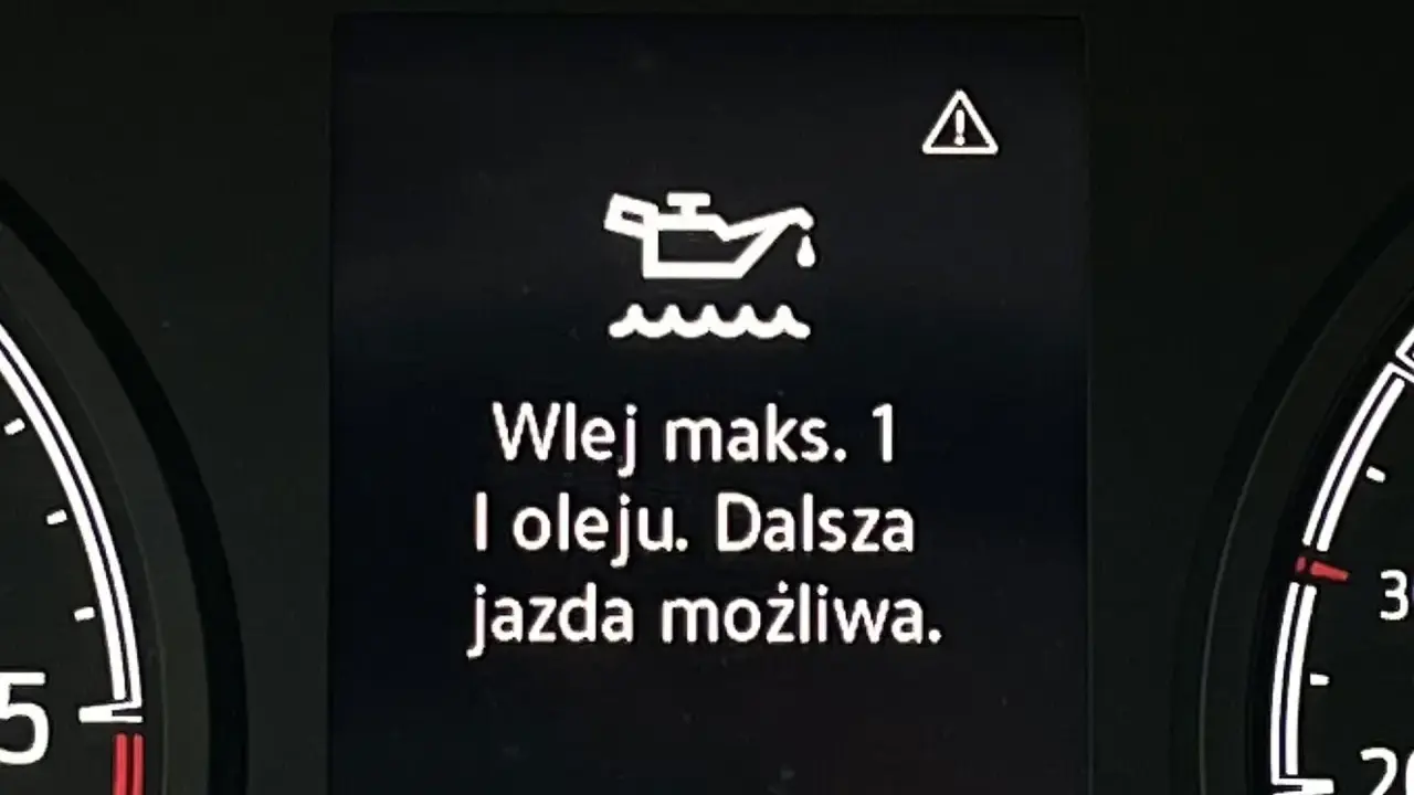 Kontrolka oleju z falą: "Wlej maks. 1 l oleju. Dalsza jazda możliwa." Ostrzeżenie o niskim poziomie oleju.