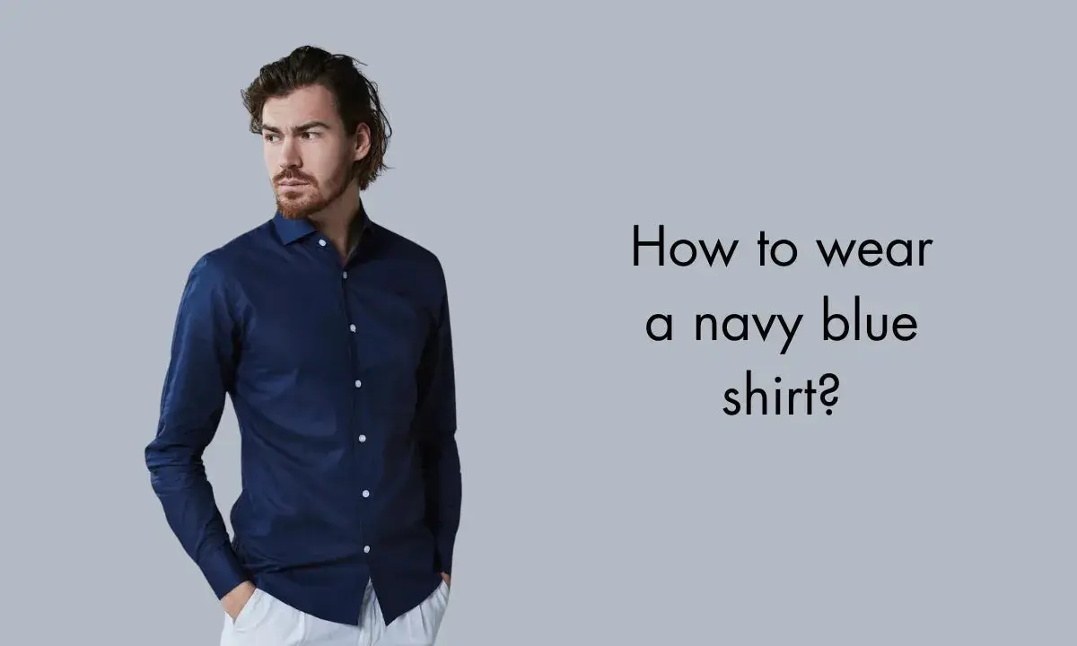 Man in a navy blue shirt and white pants, asking "How to wear a navy blue shirt?".