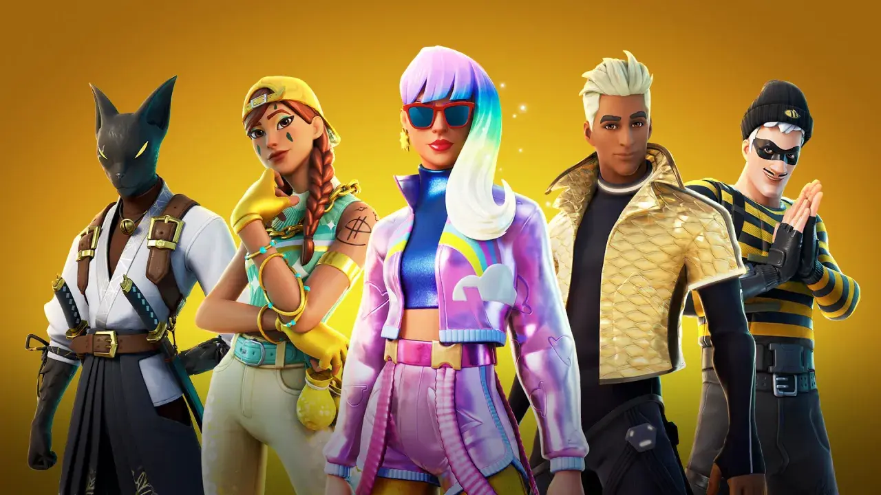Pięć postaci z Fortnite, w tym kot-samuraj i dziewczyna z tęczowymi włosami. Szukasz **fortnite kody na skiny**?