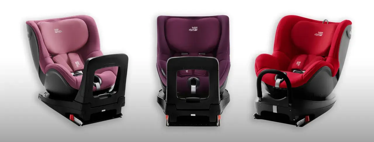 Trzy foteliki Britax Romer Dualfix w kolorach różowym, fioletowym i czerwonym, prezentujące różne kąty widzenia.