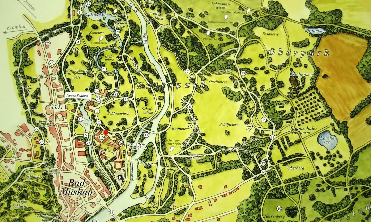 Mapa Parku Mużakowskiego z zaznaczonymi drogami, stawami, budynkami i nazwami terenów, np. Oberpark i Bad Muskau.
