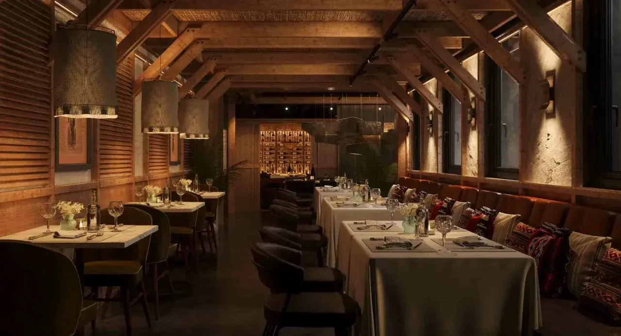 Ambiente acogedor de parrilla argentina nuevos aires. Mesas puestas, vigas de madera y luces cálidas invitan a disfrutar.