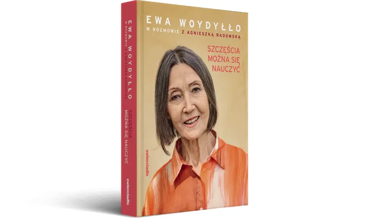 Okładka książki Ewy Woydyłło z jej portretem. Tytuł głosi: "Szczęścia można się nauczyć".