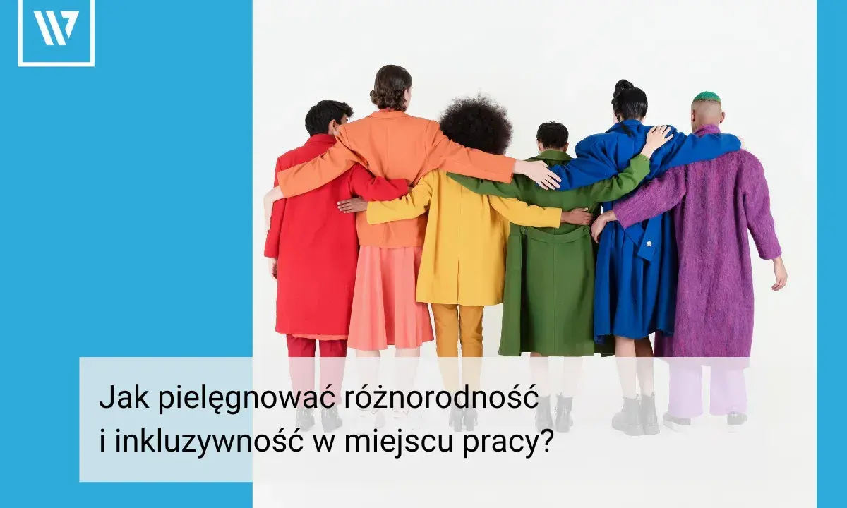 Grupa ludzi w kolorowych płaszczach obejmuje się, symbolizując inkluzywność i różnorodność w miejscu pracy.