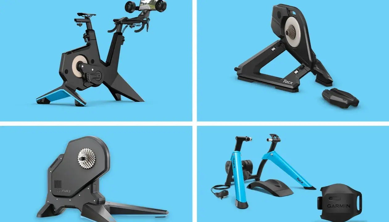 Różne modele trenażerów rowerowych, w tym Tacx Flux 2, pozwalają na trening w domu.