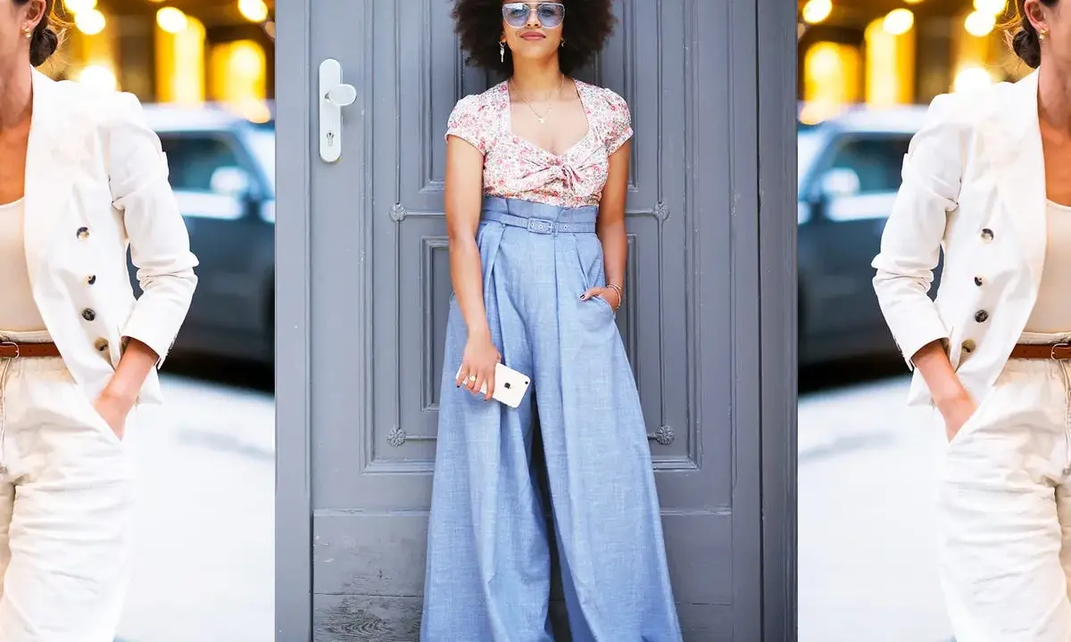 Moda: pantaloni high waist significato. Due donne con outfit eleganti, una con blazer bianco e pantaloni chiari, l'altra con crop top floreale e ampi pantaloni azzurri.
