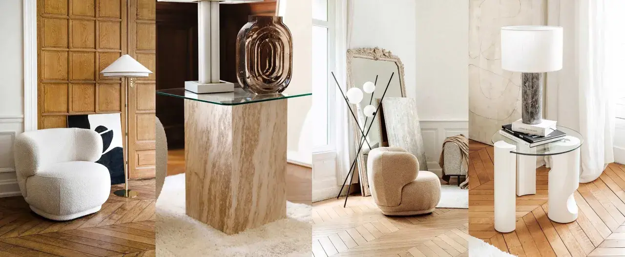 Arredamento vintage casa: poltrone soffici, tavolini in travertino e vetro, lampade di design e specchi antichi creano un'atmosfera accogliente.