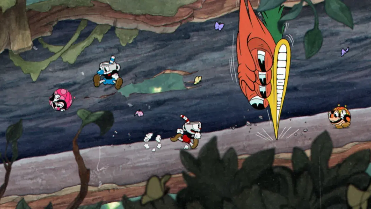 Cuphead i Mugman uciekają przed gigantyczną marchewką w jednej z najlepszych gier indie.
