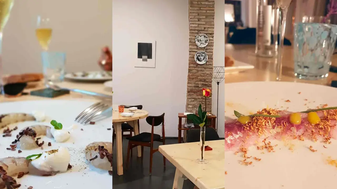 Un'elegante cena in un ristorante a Rimini. Piatti raffinati, bicchieri di vino e un'atmosfera accogliente con dettagli artistici.