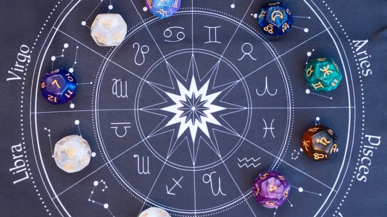 Kości do gry z symbolami zodiaku i numerologiczna 2 z 11.