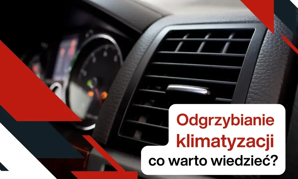 Widok na kratkę nawiewu klimatyzacji samochodowej i deskę rozdzielczą.